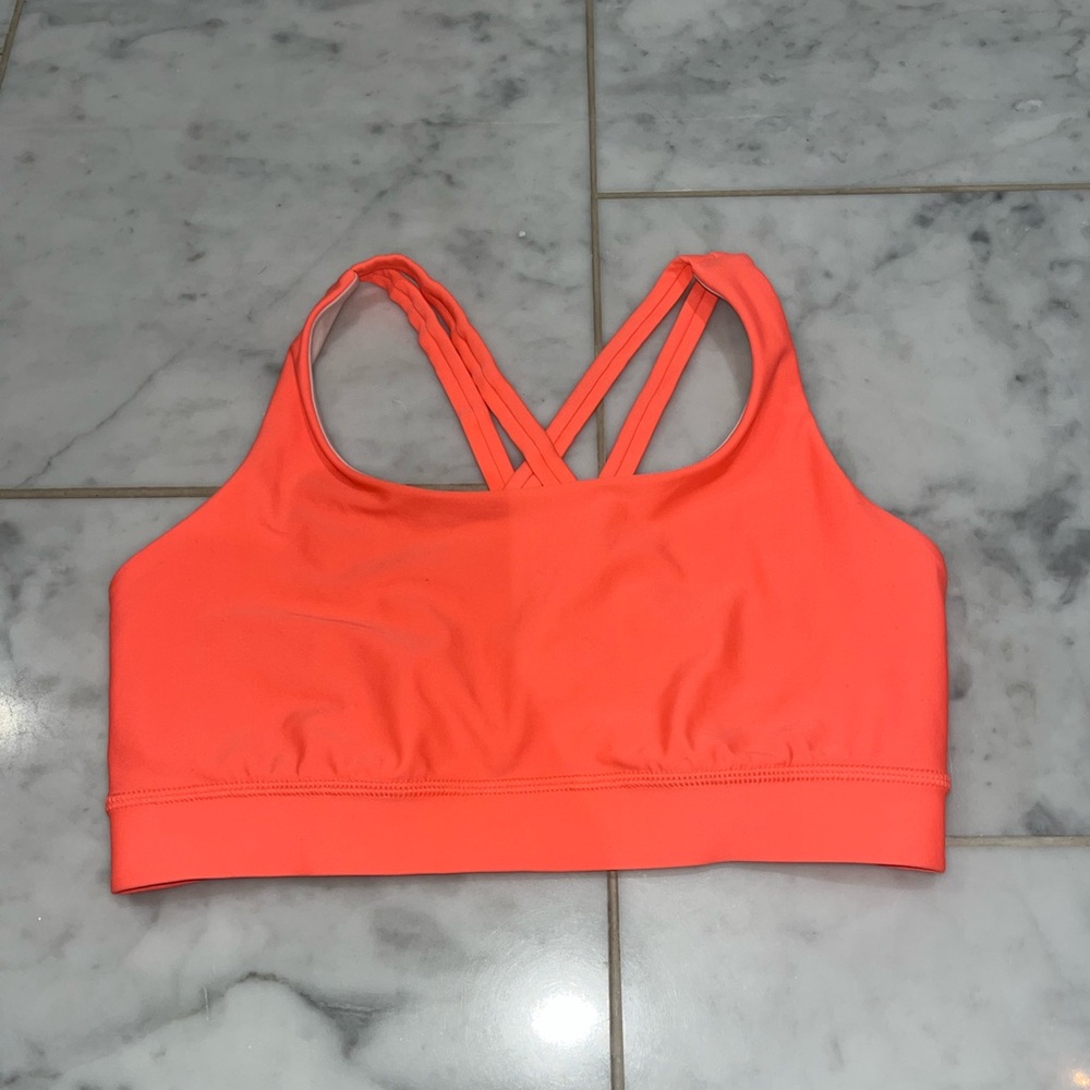 Lululemon energy bra H2O in the colour grapefruit